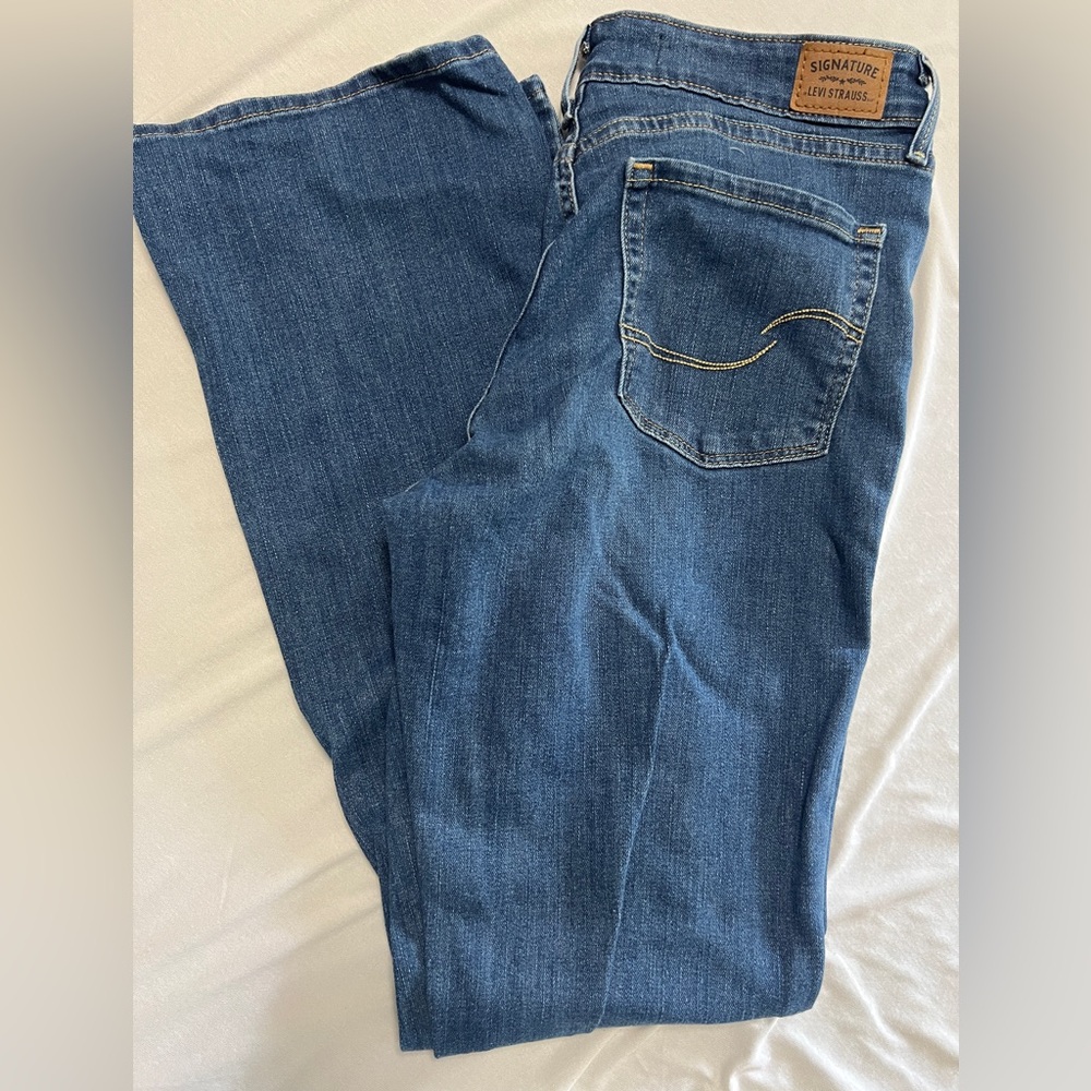 Levi midrise boot cut jeans